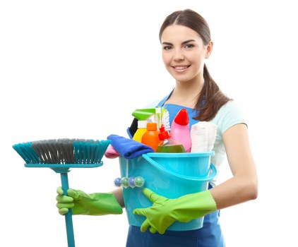 Cleaner wearing PPE while performing carpet cleaning work