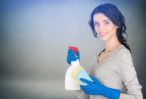 Experienced Tokyngton carpet cleaners working on a property floor